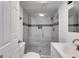 Clean bathroom features a glass-enclosed shower and updated vanity at 734 W College St, Bowdon, GA 30108