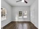 Bedroom boasts hardwood floors and lots of natural light at 734 W College St, Bowdon, GA 30108