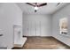 Large bedroom boasts hardwood floors and a fireplace at 734 W College St, Bowdon, GA 30108