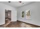 Bedroom boasts hardwood floors and lots of natural light at 734 W College St, Bowdon, GA 30108
