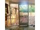 View of the screened-in porch, providing a relaxing outdoor space with views of the backyard at 1723 Fort Valley Sw Dr, Atlanta, GA 30311