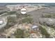 Expansive aerial view of the property, showcasing its location near Atlanta Motor Speedway and surrounding community at 130 Nicki Ct, Hampton, GA 30228