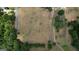 Aerial view of property showing large pasture and house at 1024 Bethany Rd, Covington, GA 30016