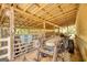 Barn with stalls, tractor, and overhead shelter at 1024 Bethany Rd, Covington, GA 30016