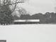 Ranch house exterior view covered in snow at 1024 Bethany Rd, Covington, GA 30016