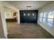 Bright dining room features hardwood floors and a stylish chandelier at 130 Windchime Way # 9, Tyrone, GA 30290