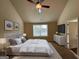 Large main bedroom with vaulted ceiling and plenty of natural light at 2299 Church St, Hampton, GA 30228