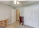 Bedroom with ceiling fan and double doors at 399 Towler, Loganville, GA 30052