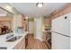 Modern kitchen with stainless steel appliances and white cabinetry at 399 Towler, Loganville, GA 30052