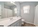 Bathroom with a single vanity, tile flooring and shower with curtain at 625 Aya Cir, Loganville, GA 30052