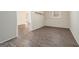 Bedroom featuring stylish laminate floors, and a large bright window at 625 Aya Cir, Loganville, GA 30052