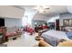 Spacious bedroom features sloped ceilings, ceiling fan, and carpeted floors at 50 Persian Pl, Whitesburg, GA 30185