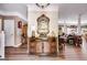 Elegant foyer featuring hardwood floors, a decorative mirror, and an open view into the living spaces at 50 Persian Pl, Whitesburg, GA 30185