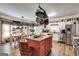 Bright kitchen featuring a center island, stainless steel appliances, and a dining area at 50 Persian Pl, Whitesburg, GA 30185