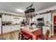 Spacious kitchen with granite countertops, stainless steel appliances, and a pot rack at 50 Persian Pl, Whitesburg, GA 30185