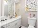 Stylish half-bathroom with updated vanity and modern fixtures at 6 Alston Ne Pl, Atlanta, GA 30324