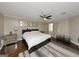 Bright bedroom with modern decor, a ceiling fan, and hardwood floors at 6 Alston Ne Pl, Atlanta, GA 30324