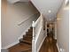 Hallway with wood floors and stairs at 6 Alston Ne Pl, Atlanta, GA 30324