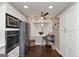 Charming eat-in kitchen with stainless steel appliances and white cabinets at 6 Alston Ne Pl, Atlanta, GA 30324