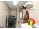 Efficient laundry room with modern washer, dryer, and ample storage, optimizing functionality and convenience at 6 Alston Ne Pl, Atlanta, GA 30324