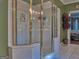 Large walk-in shower with glass enclosure at 624 Champions Dr, Mcdonough, GA 30253