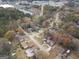 Aerial view of neighborhood with homes and trees at 108 Adrian Dr, Stockbridge, GA 30281
