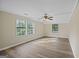 Spacious bedroom with wood flooring and large window at 108 Adrian Dr, Stockbridge, GA 30281