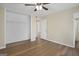 Bedroom with wood floors, ceiling fan and closet at 108 Adrian Dr, Stockbridge, GA 30281