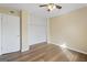 Well-lit bedroom with wood flooring and closet at 108 Adrian Dr, Stockbridge, GA 30281