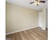 Bright bedroom with ceiling fan and wood-look flooring at 108 Adrian Dr, Stockbridge, GA 30281