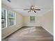 Large bedroom featuring wood flooring and dual windows at 108 Adrian Dr, Stockbridge, GA 30281