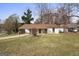 Single story home with carport and front yard at 108 Adrian Dr, Stockbridge, GA 30281
