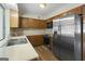 Kitchen boasts stainless steel appliances and wood cabinets at 108 Adrian Dr, Stockbridge, GA 30281
