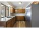 Kitchen offers stainless steel appliances and ample wood cabinetry at 108 Adrian Dr, Stockbridge, GA 30281