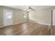 Hardwood floor living room with neutral walls and an exterior door at 108 Adrian Dr, Stockbridge, GA 30281