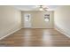Spacious living room featuring hardwood floors and lots of natural light at 108 Adrian Dr, Stockbridge, GA 30281