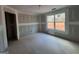 Unfinished bedroom with a window and closet at 1563 South Bethany Rd, Mcdonough, GA 30252