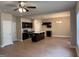 Spacious kitchen with dark cabinetry, granite countertops, and stainless steel appliances at 1555 South Bethany Rd, Locust Grove, GA 30248