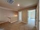 Upstairs loft area with neutral carpeting and fresh paint at 1555 South Bethany Rd, Locust Grove, GA 30248