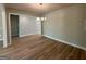 Spacious dining room boasting recessed lighting, seamlessly connecting to other spaces at 1547 South Bethany Rd, Locust Grove, GA 30248