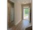 Bright foyer features wood-look flooring leading to the rest of the home at 1547 South Bethany Rd, Locust Grove, GA 30248