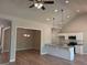 Modern kitchen with an island, stylish countertops and stainless steel appliances at 1547 South Bethany Rd, Locust Grove, GA 30248