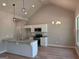 Well-lit kitchen area offering a functional island and modern finishes at 1547 South Bethany Rd, Locust Grove, GA 30248