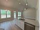 Spacious kitchen featuring a modern island and an open floor plan at 1547 South Bethany Rd, Locust Grove, GA 30248