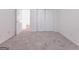 Bedroom featuring neutral carpet and a closet at 334 Royal Crescent Way, Stockbridge, GA 30281