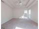 Bright and spacious bedroom featuring plush carpeting, tray ceiling and large windows with natural light at 334 Royal Crescent Way, Stockbridge, GA 30281