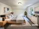 Light-filled bedroom with a comfortable bed, stylish decor, and a serene atmosphere at 4405 Cary Dr, Snellville, GA 30039