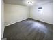 Simple bedroom with a neutral color scheme, a window, and carpeting at 4405 Cary Dr, Snellville, GA 30039