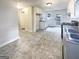 Eat-in kitchen with modern appliances, ample cabinets, and exterior door to deck at 4405 Cary Dr, Snellville, GA 30039