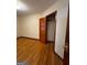Cozy bedroom showcasing hardwood floors and a closet; a comfortable retreat at 1511 Walker Ave, College Park, GA 30337